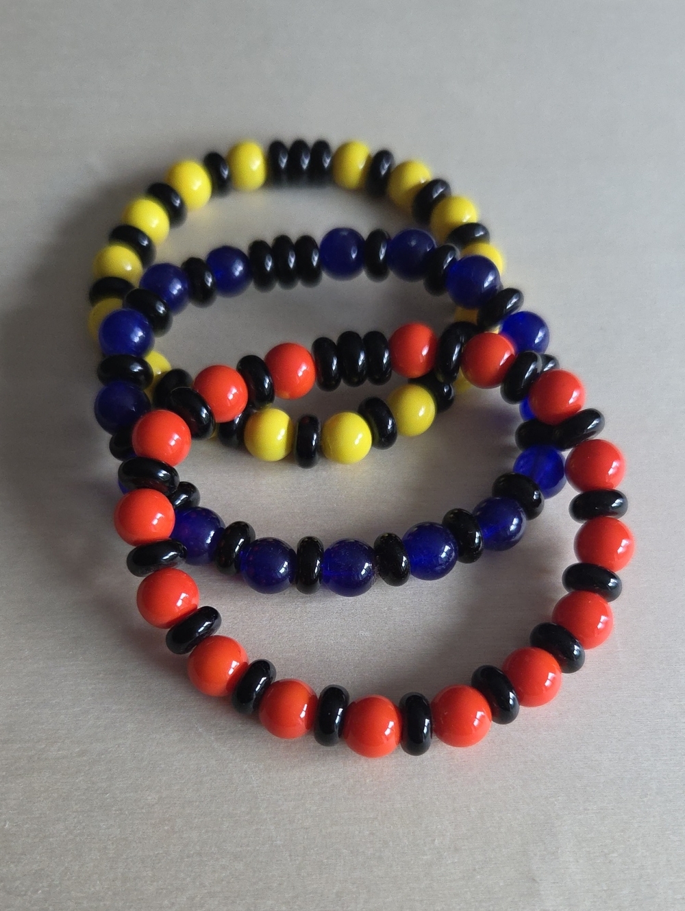 Multicolor Beaded Stretch Bracelet Set — Orange, Blue, Yellow & Black